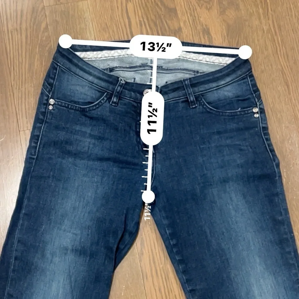 Vintage designer jeans size 28. Not sure the brand